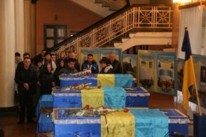 похоронили